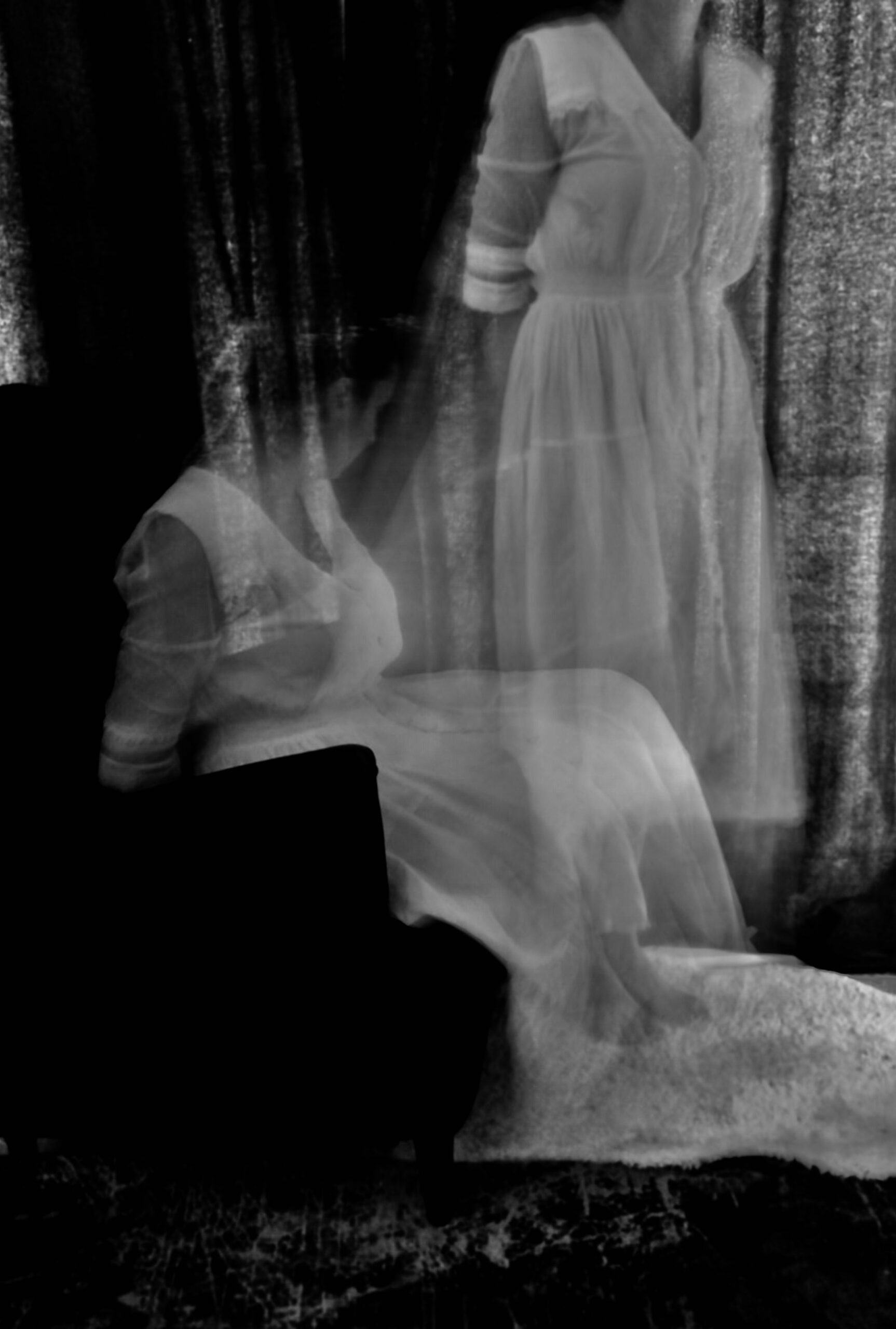 A ghost figure in black and white.